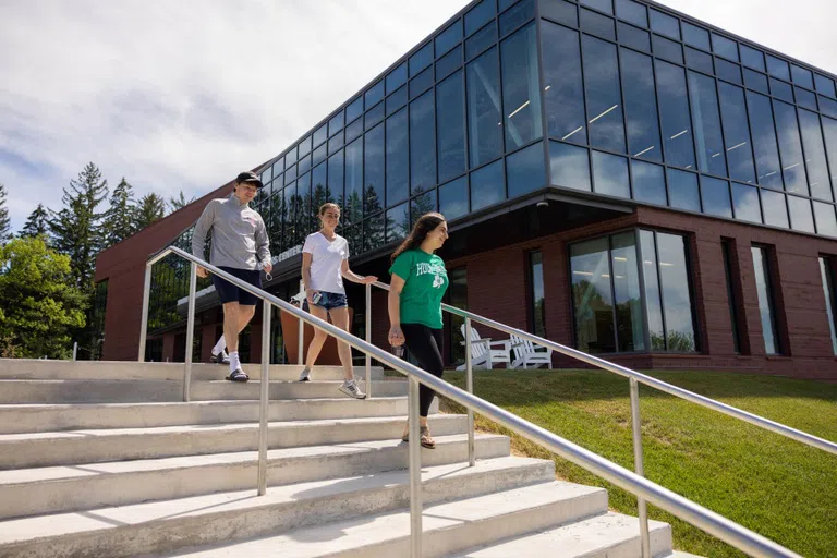 Students walking out of the building