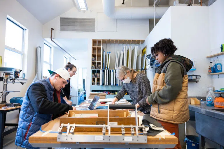 Students working in a printmaking class 