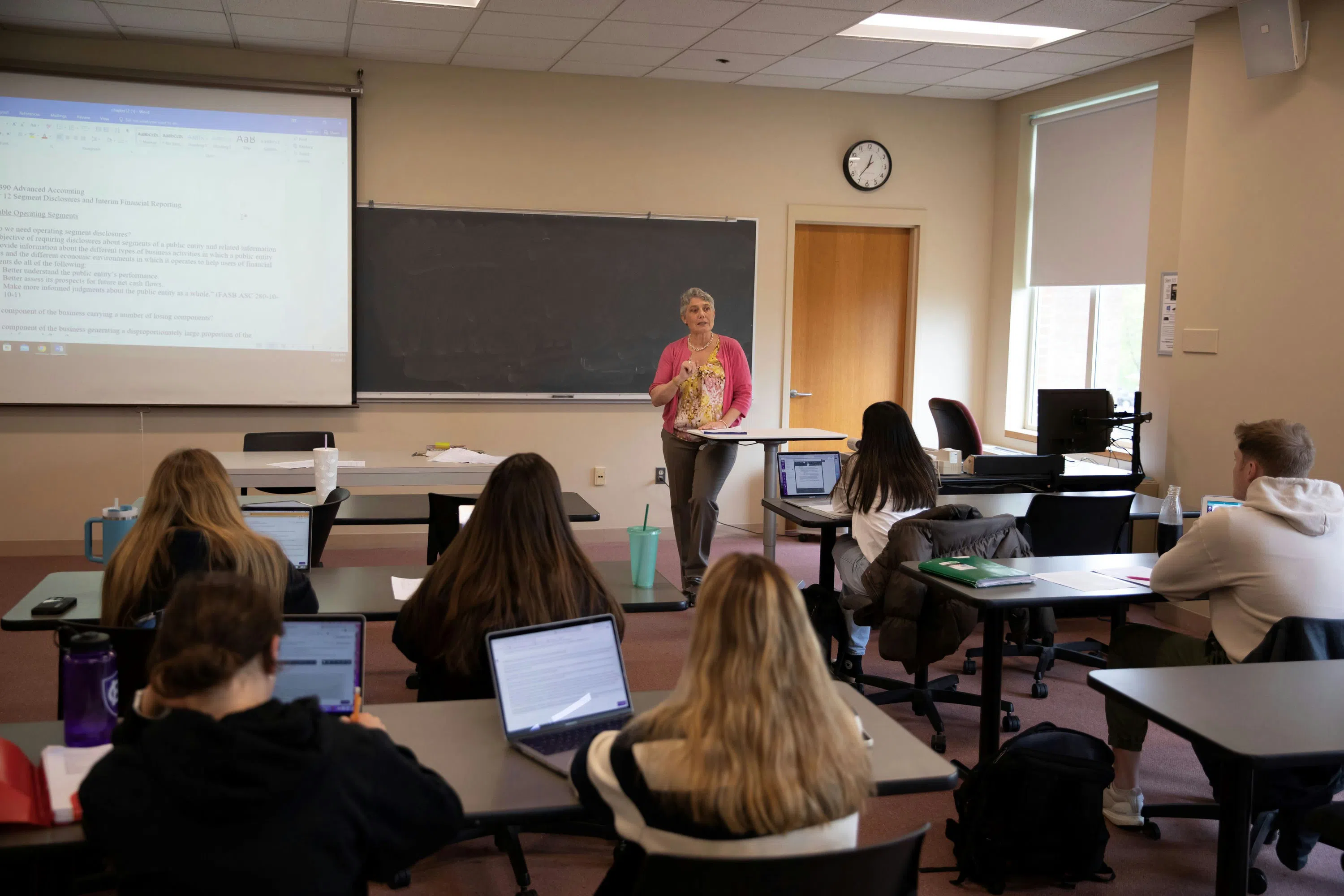 Professor teaching in Stein classroom