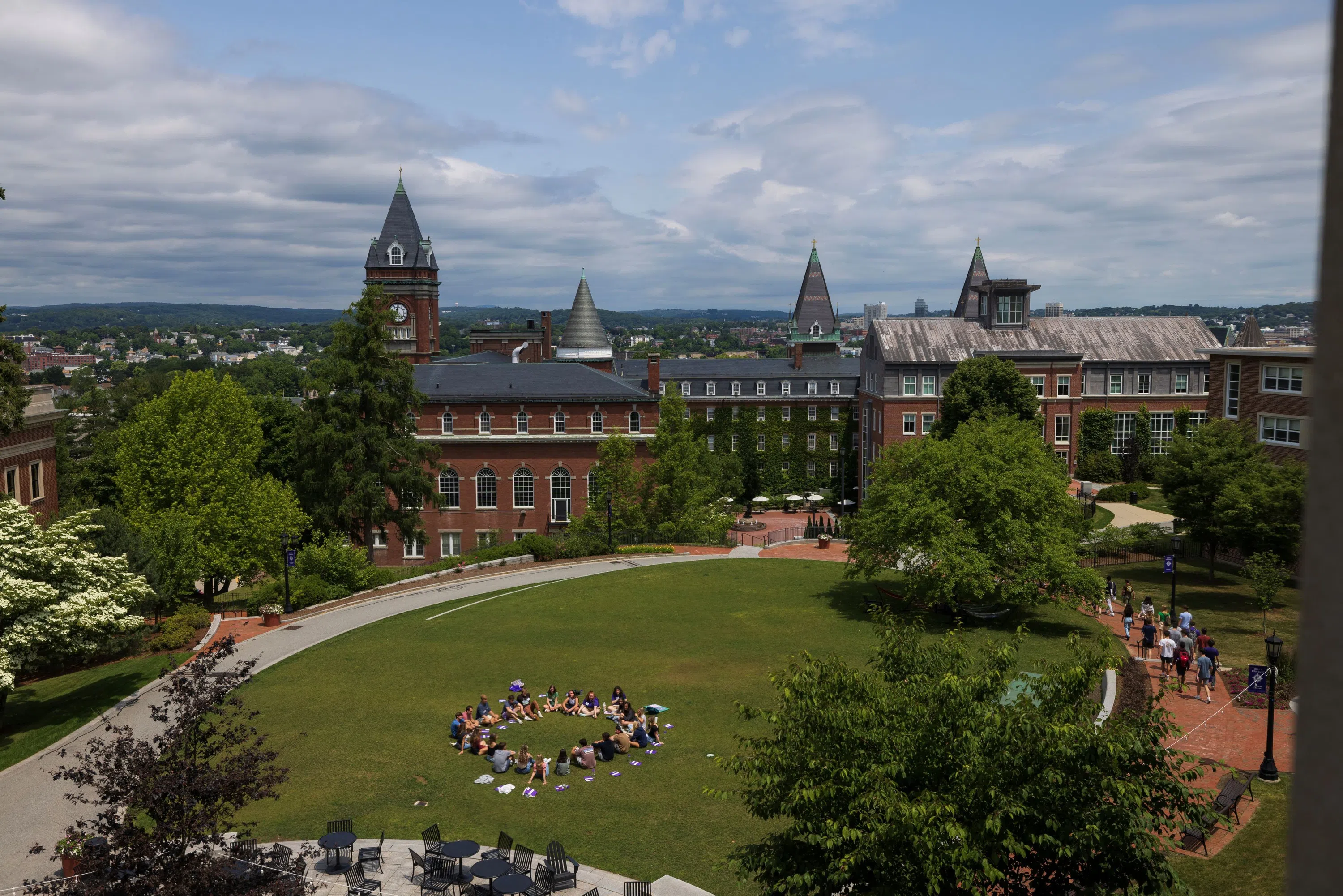 Aerial image of students gathered on the grassy common