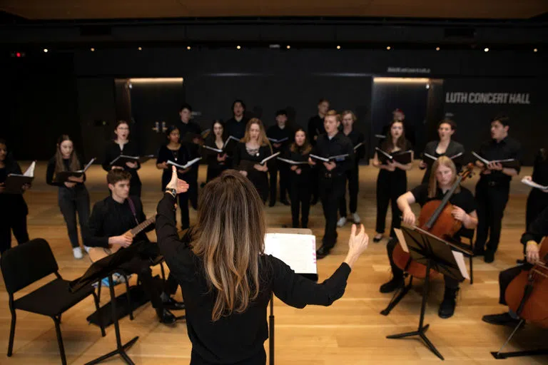 Students performing in the Prior Beehive