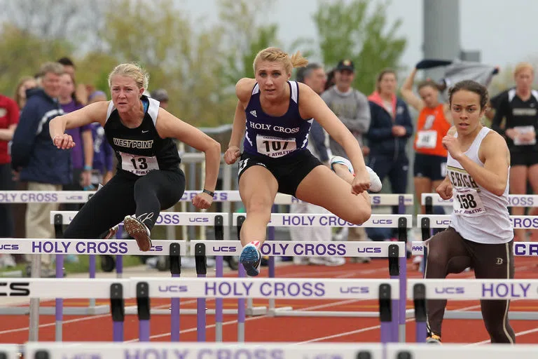 Student track and field athlete competing 