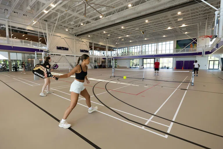 Students playing pickleball in The Jo