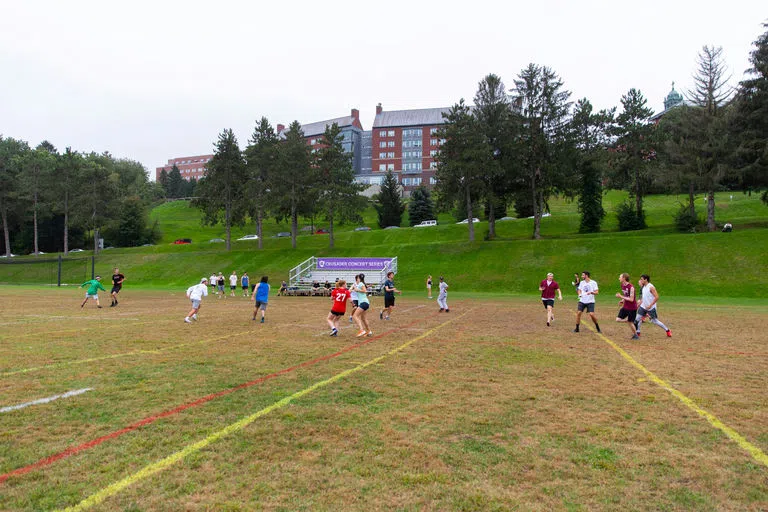 Students playing ultimate frisbee