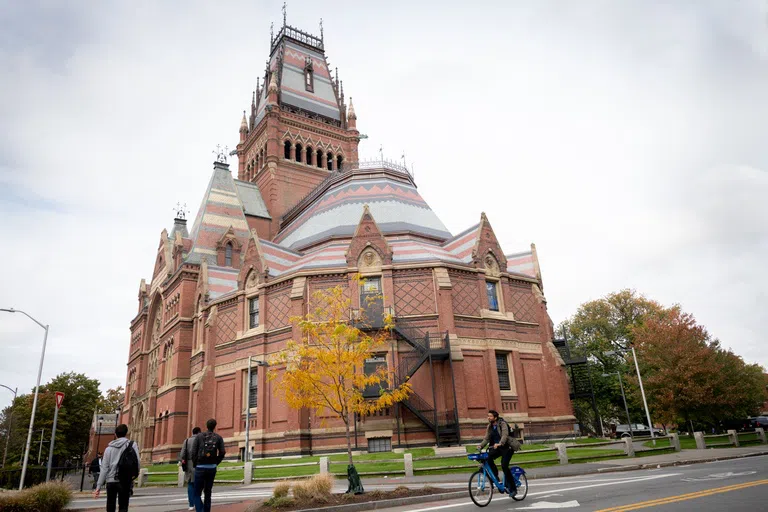 Red brick Gothic architecture building with spired tower