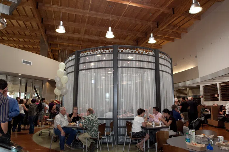 students seated around elegant dining area