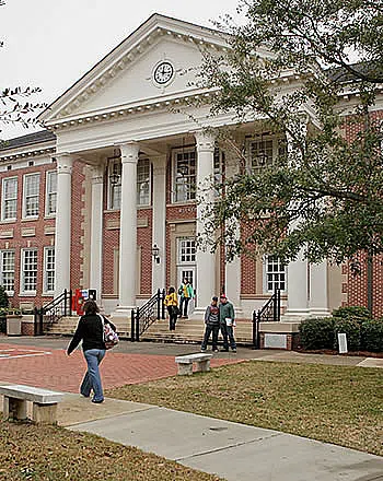 Students walk into Walker Hall.