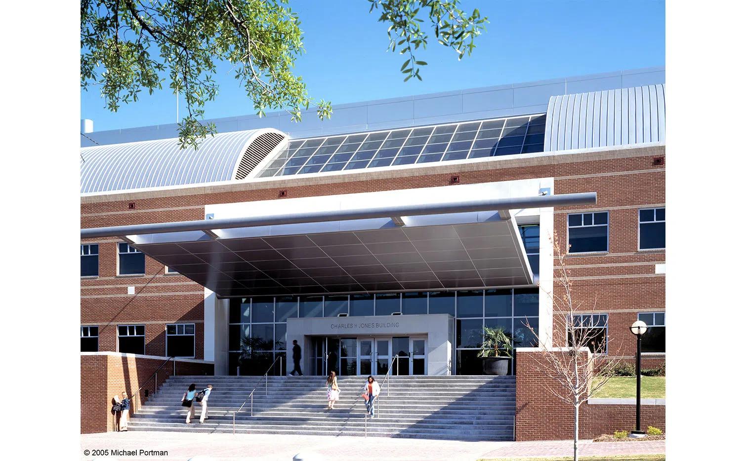 The front entrance of the Charles H. Jones Building on a sunny day.