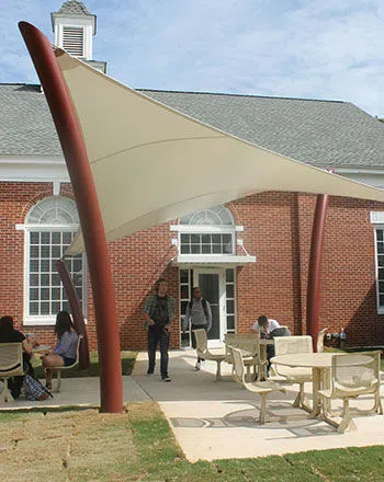 Students socialize on the Thomas Hall patio.