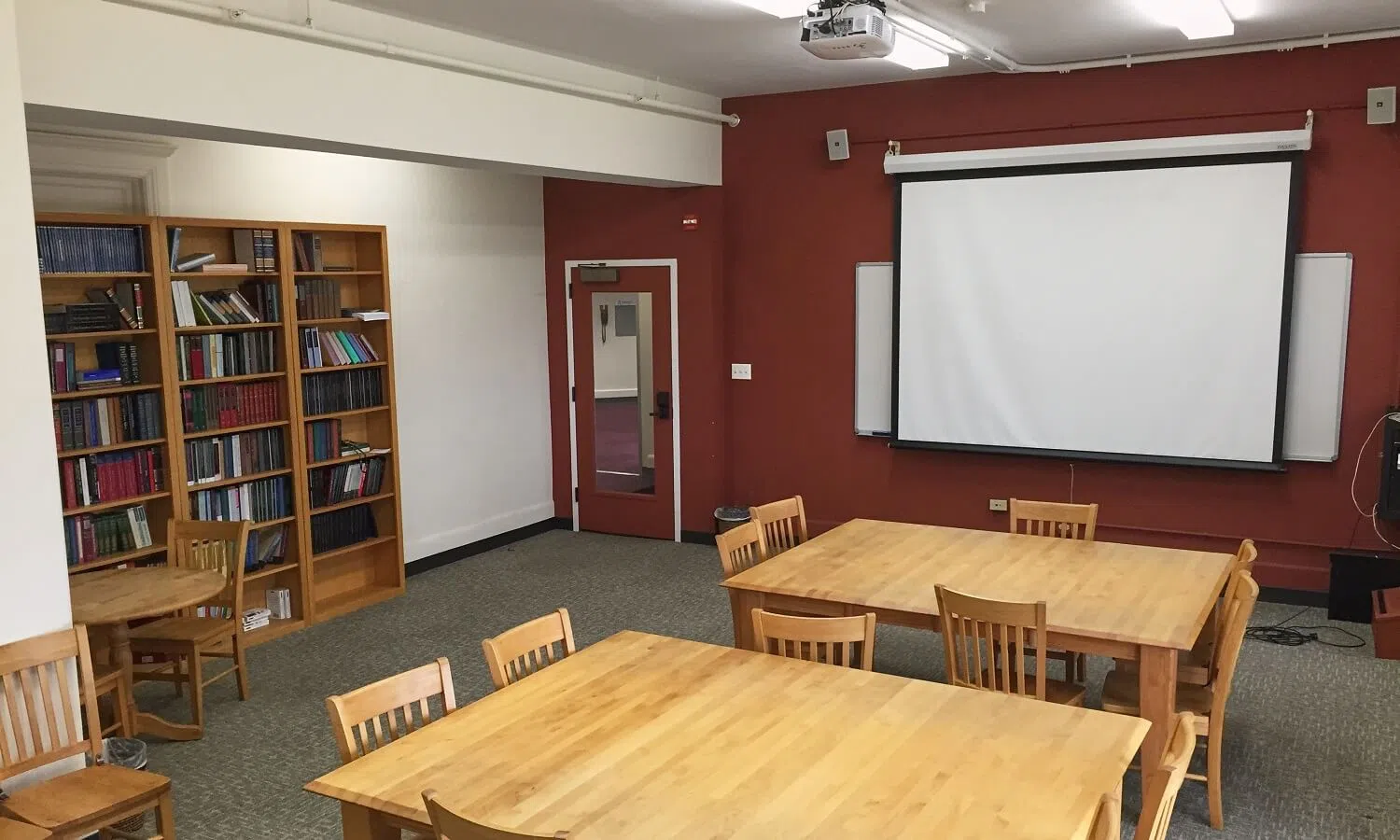 The inside of the reading room in the Auditorium Building is filled with desks and chairs so students can study