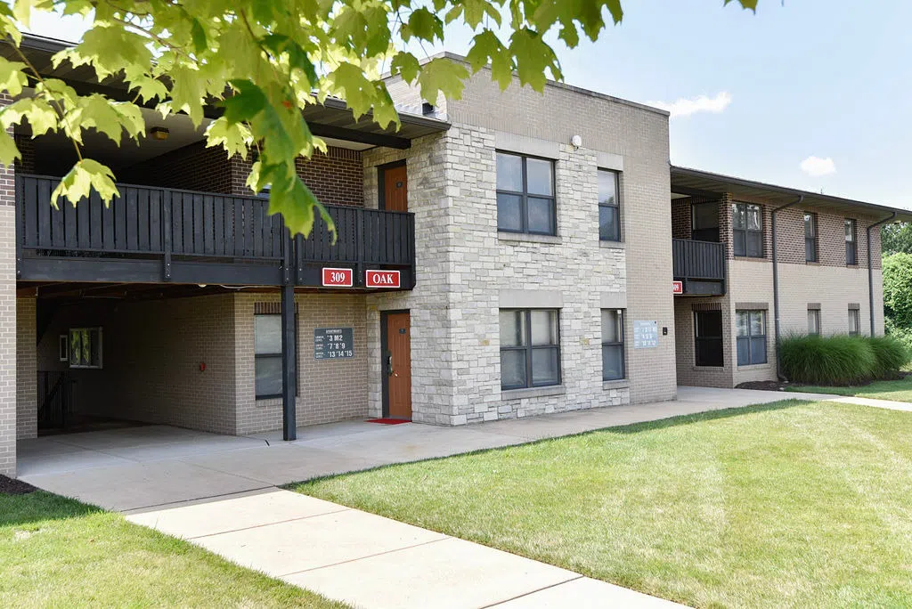 Photos of the exterior of the apartment buildings.