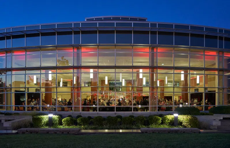 Gander Dining Hall lit up at night. 