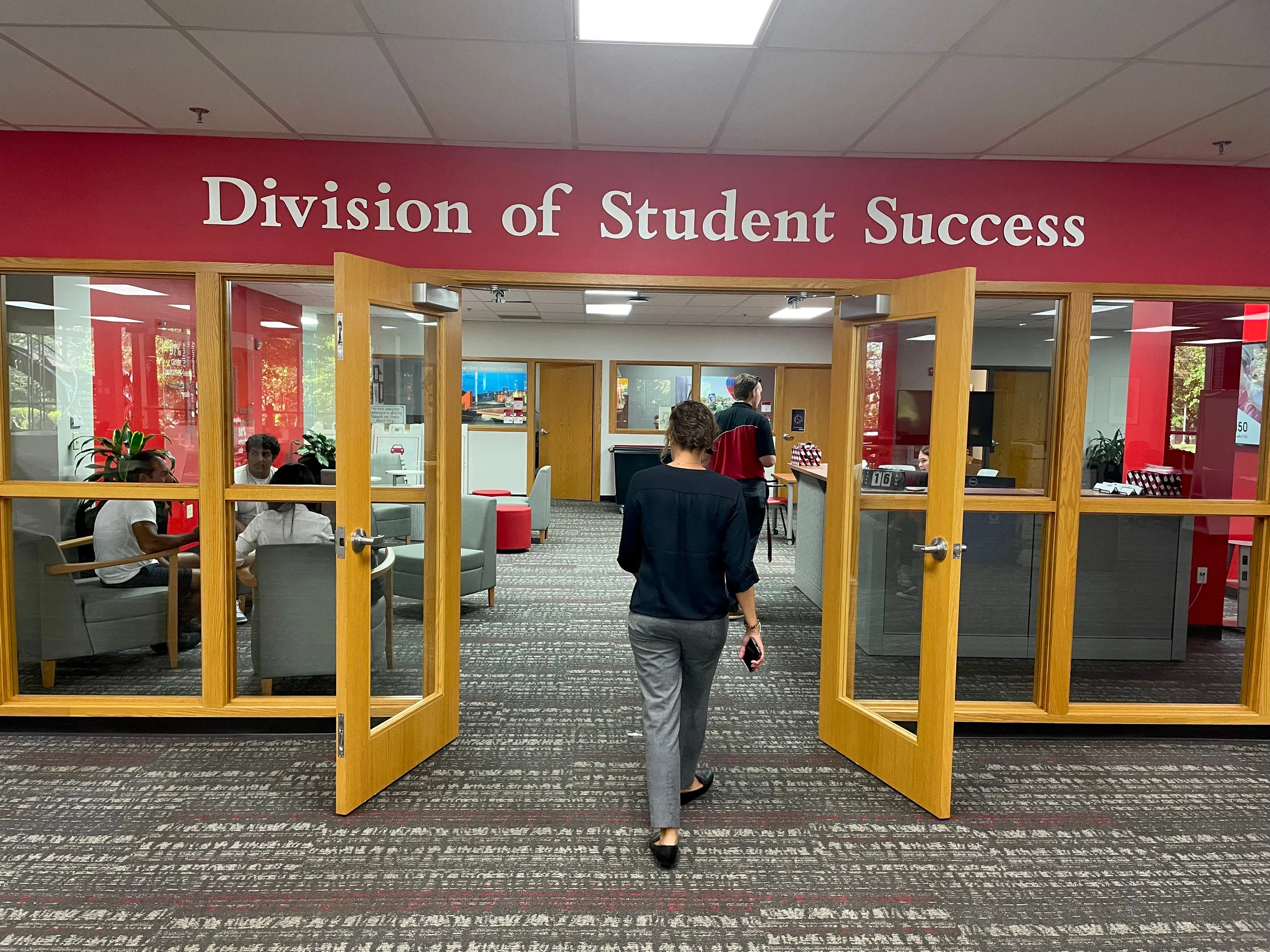 People walk into the Division of Student Success.