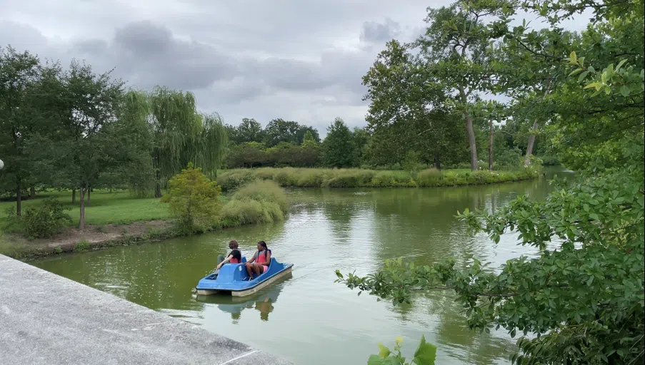 Two people on a Paddle Boat at The Boathouse