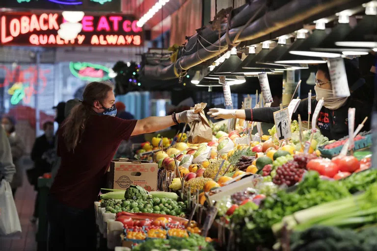 Produce stall with display of fruits and vegetables 