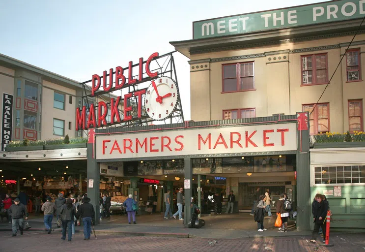 Entrance of market with various signs