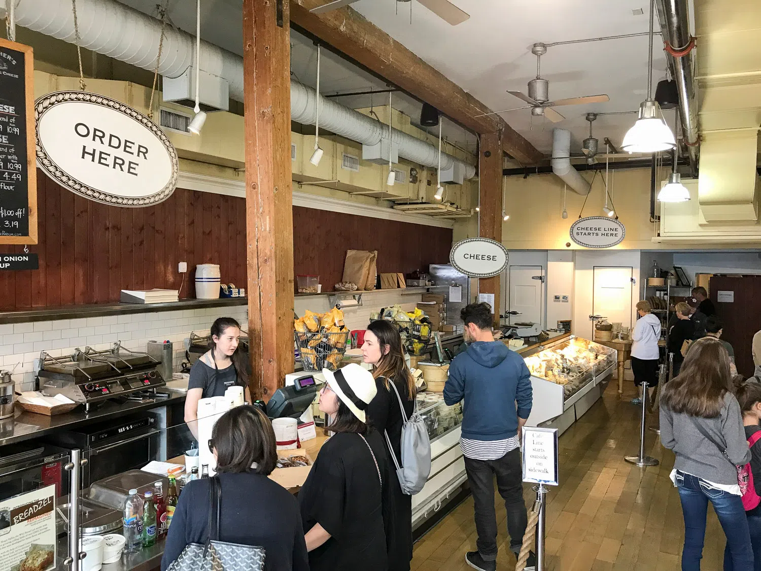 Customers ordering inside Beecher's