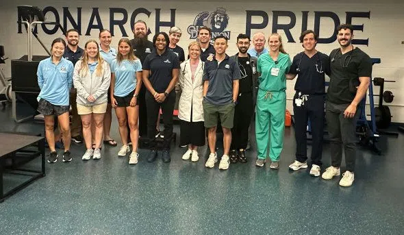 Students administer sports physicals