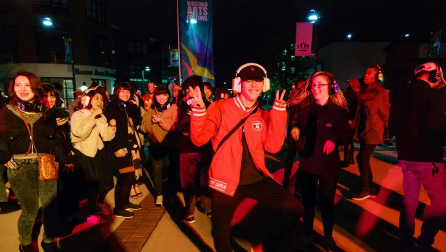 Students dance at a silent disco