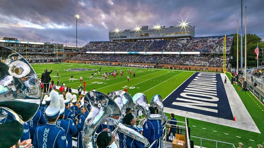 The marching band cheers on the team