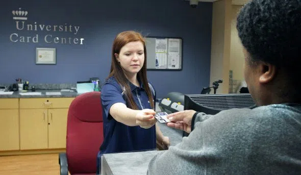 Student receives assistance with card services