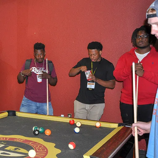 Students have the option to play pool and hang out within the Brown Hall lobby.