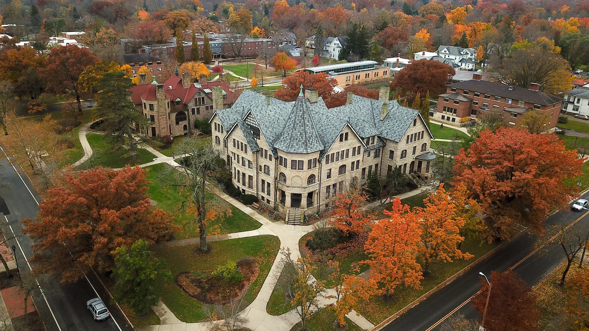 An aerial view of Talcott Hall, Baldwin Cottage, and some other buildings.