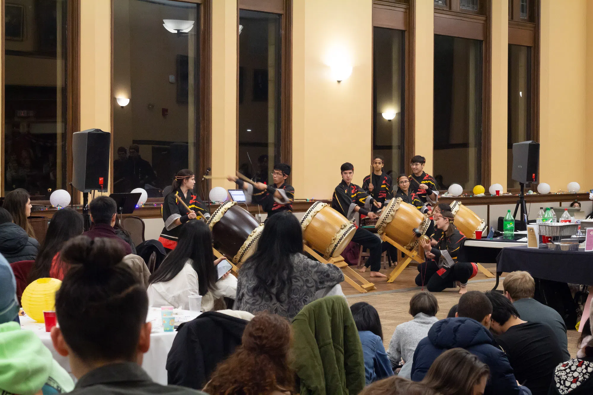 Students doing taiko drumming at the Asian Night Market