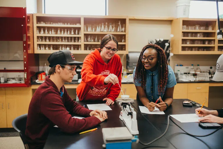 Students collaborating in lab classroom in the Science & Ag Building