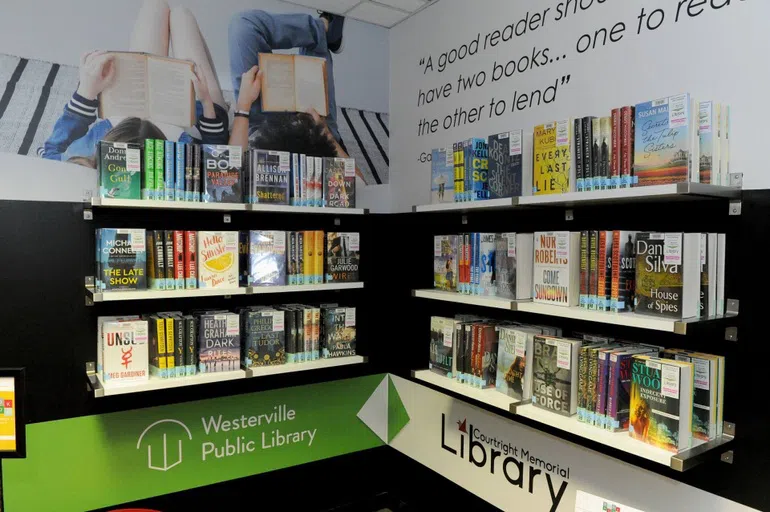 Bookshelves with books facing forward on them