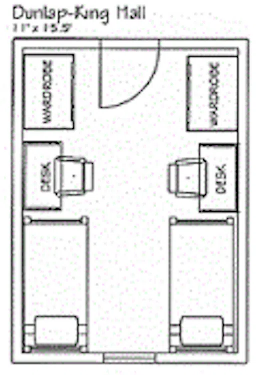 Double-occupancy room with beds on each side and a desk at the foot of each.