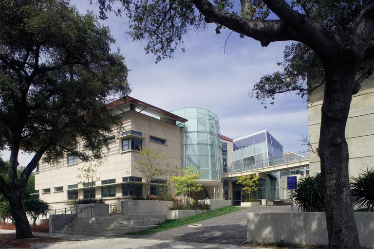 Day time view of Seaver Building with trees