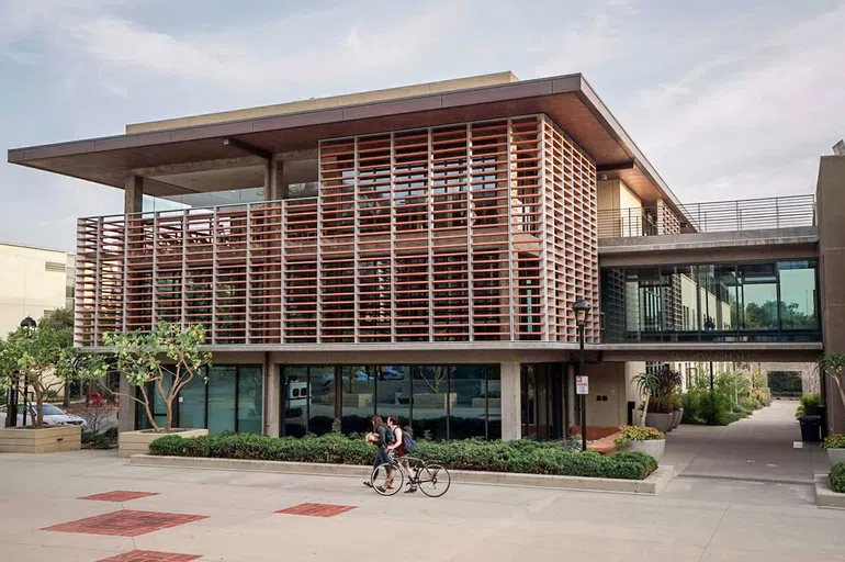 Modern looking building with students walking