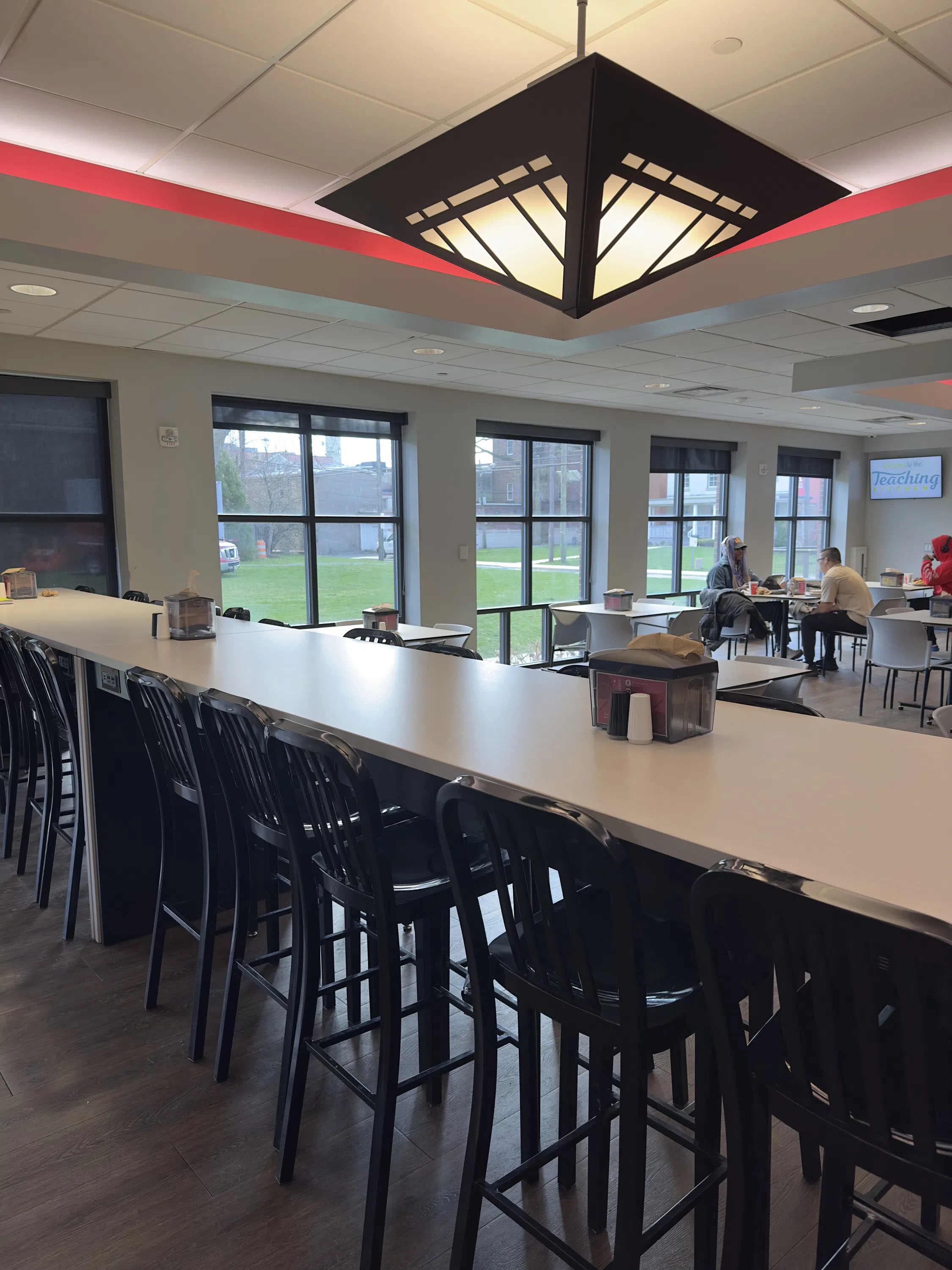 Several dining room tables are available to students and staff.