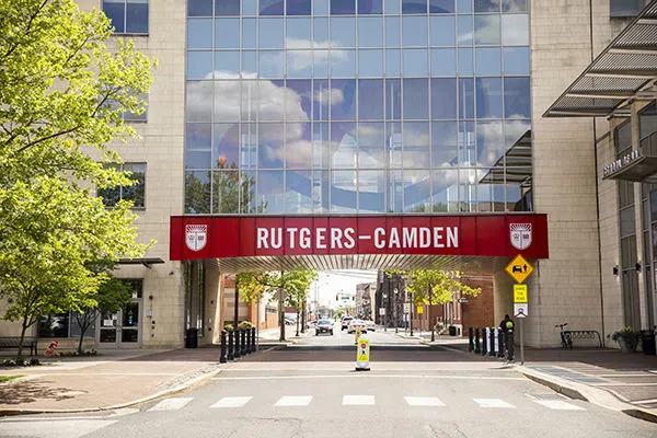 An outside view of the building and entrance of the Rutgers Law School.