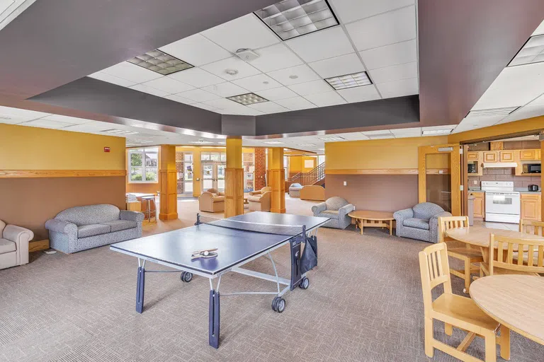 Community and lounge space with ping pong table in Gainey Hall.