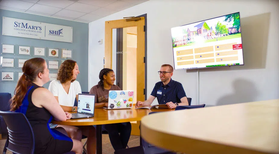 The people seated in the Center for Career and Professional Development conference room