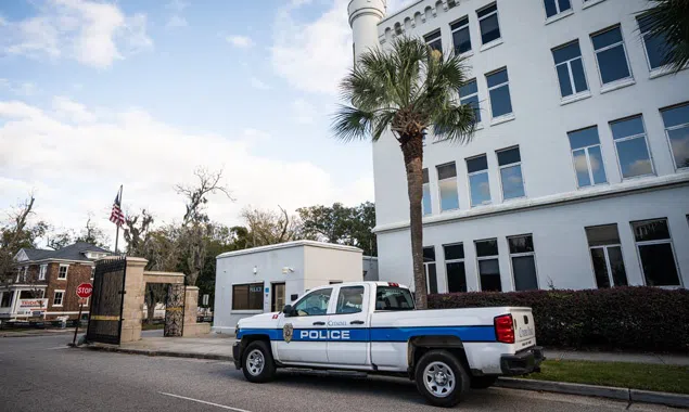 Exterior of Public Safety building with police car in front of building