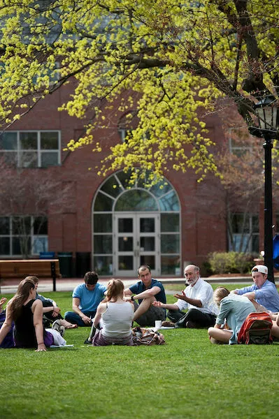 Taking advantage of nice weather and taking class outside the Olin Center ☀️