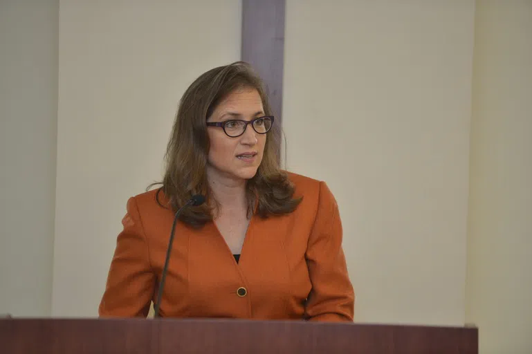 Natalie Tennant speaks at a podium.