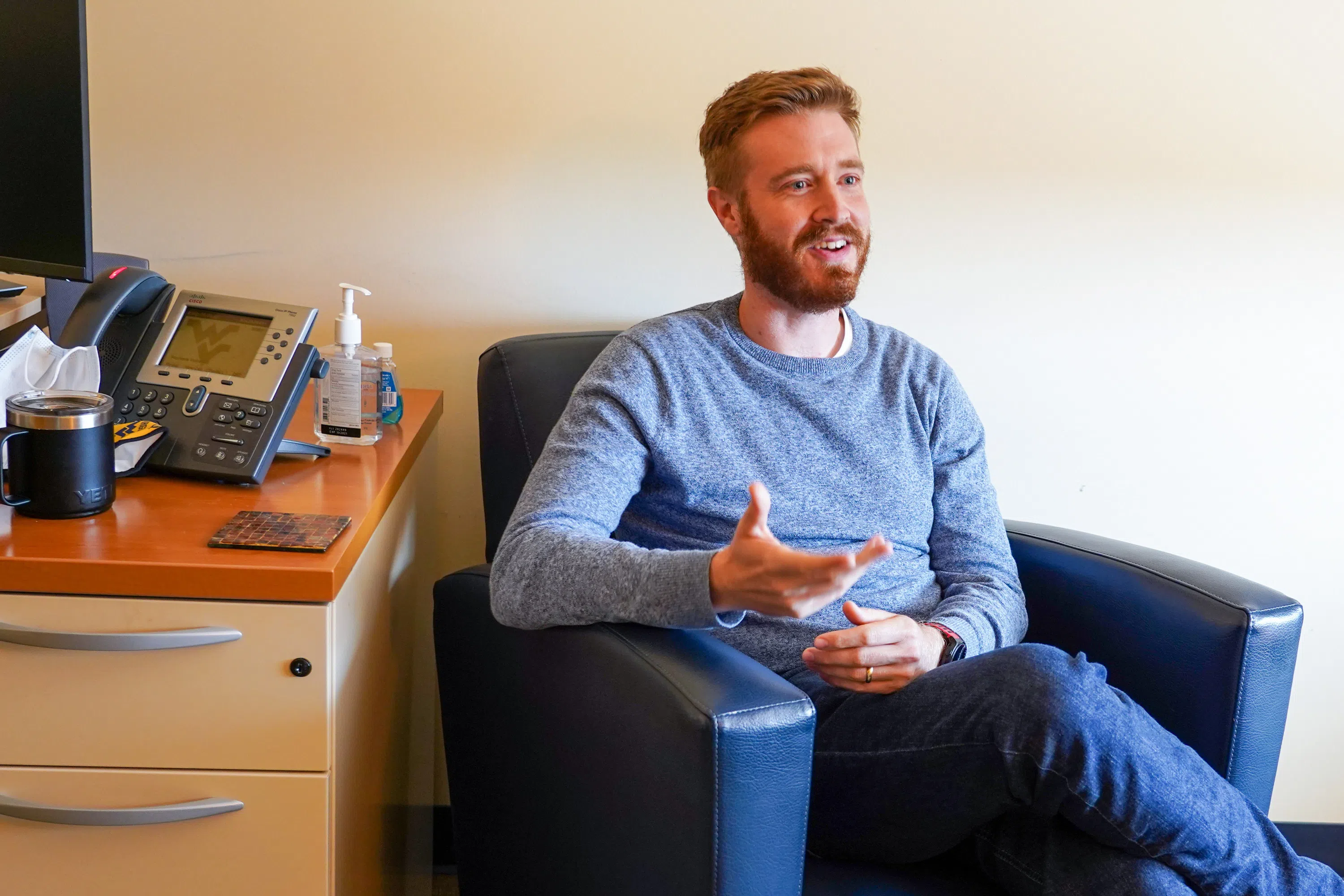 Student sitting and speaking to a counselor in the Carruth Center.