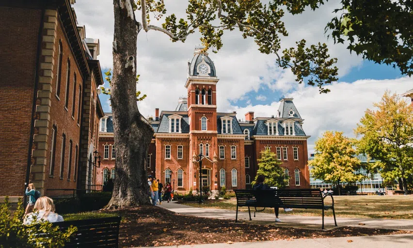 A sunny photo of Woodburn Hall 