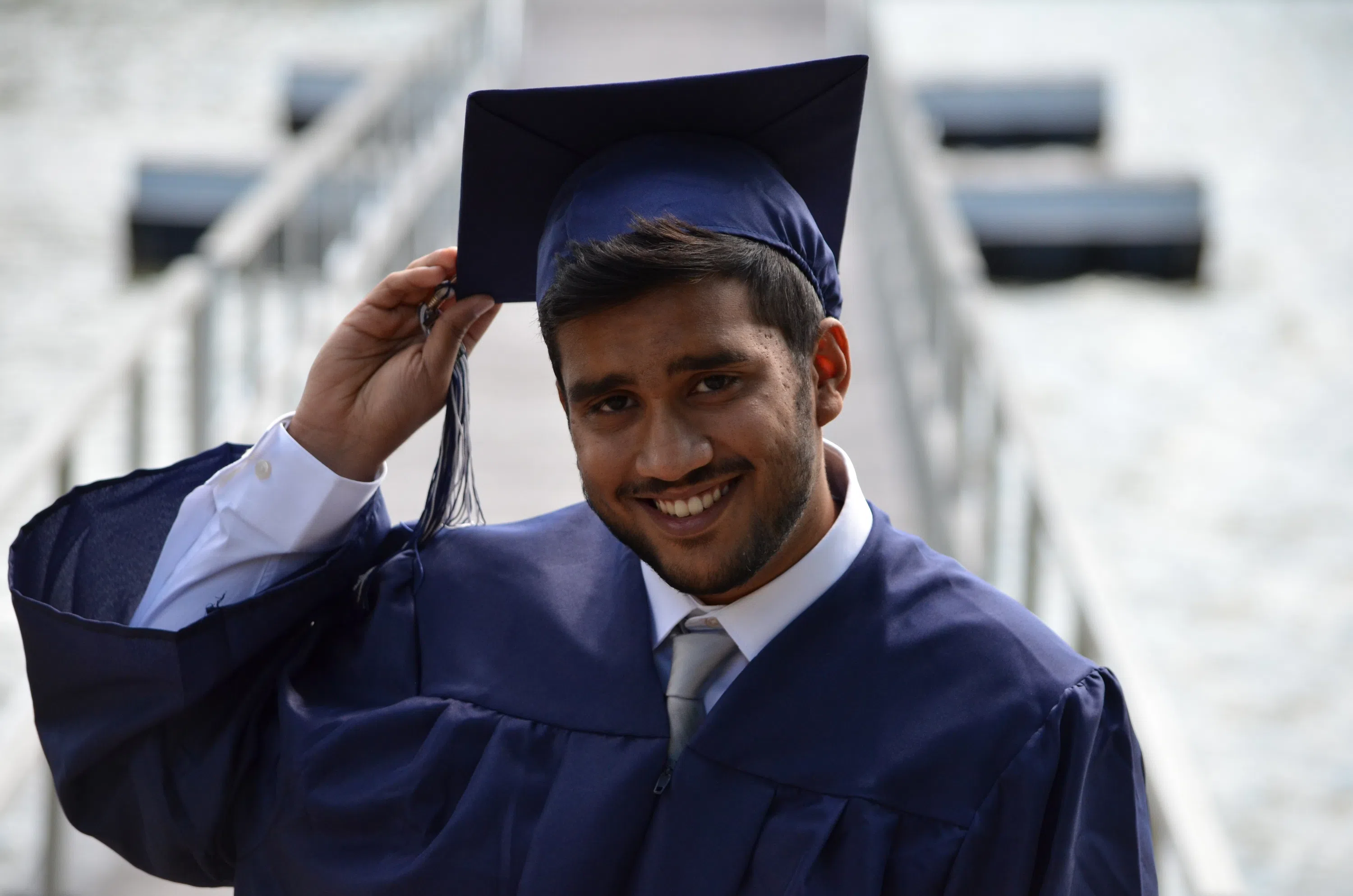 Graduate tipping mortar board 