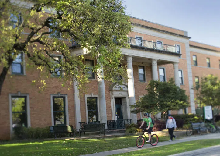 Students heading to class outside of Maple Hall 