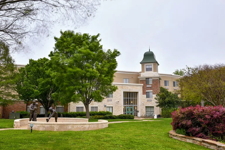  A photo of the exterior of Mozart Square on a sunny day.