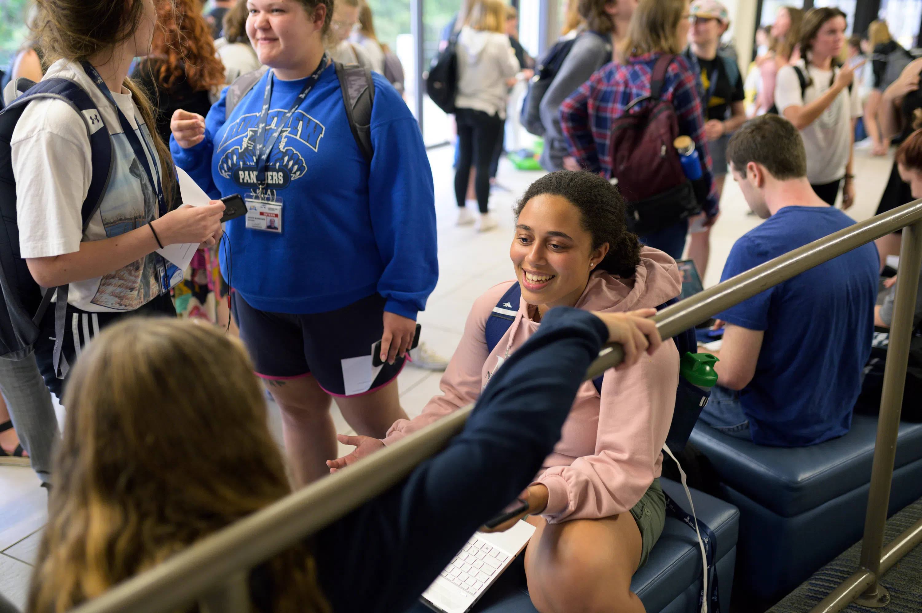 Students sit and chat