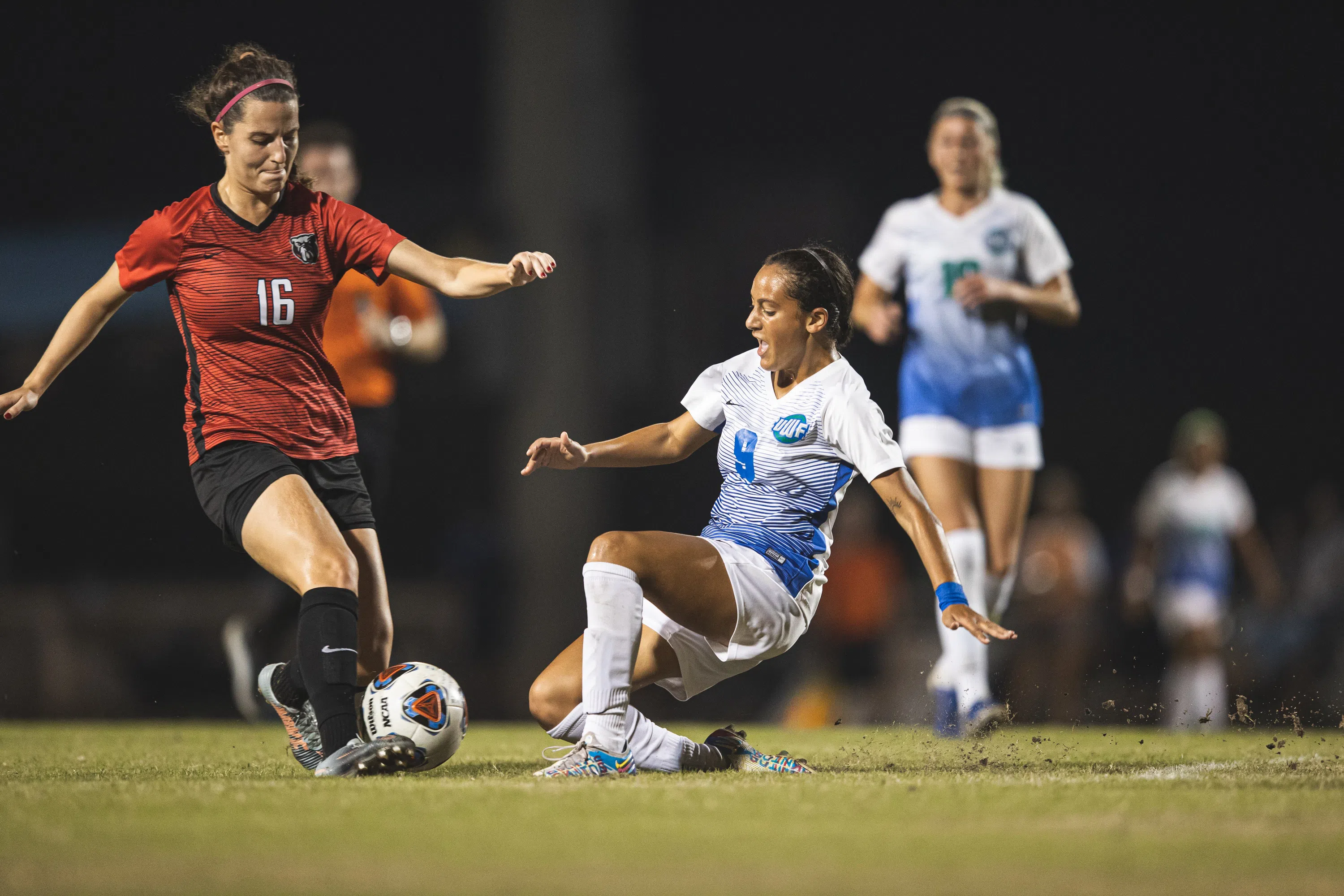 Women playing soccer