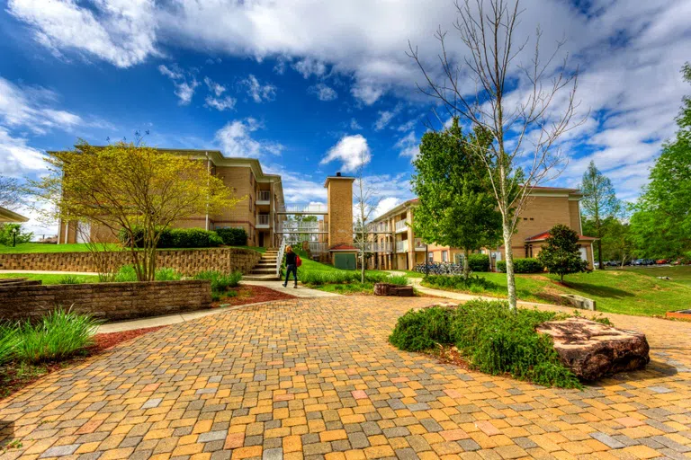 Cobble stone walkways outside Village East Apartments