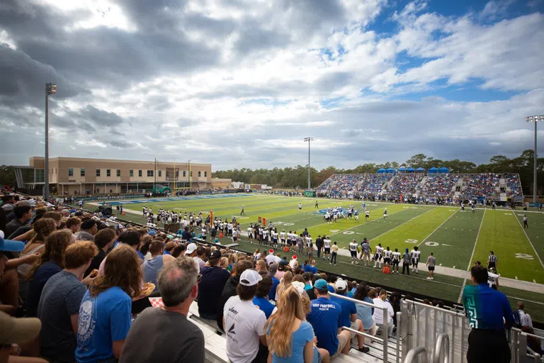 Fans watching football at UWF Pen Air Field