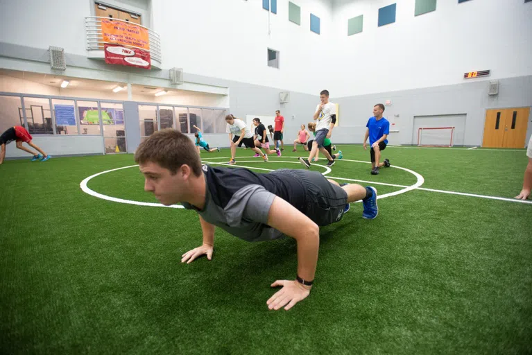 Students exercising in a group class.